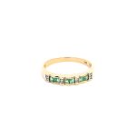 9ct Yellow gold Emerald and diamond eternity ring